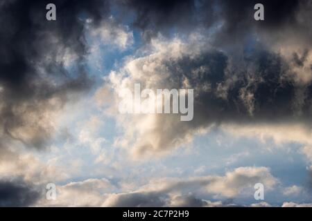 A break in the clouds showed the multiple layer of the storm Stock Photo