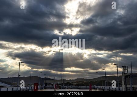 Sunlight Breaking the Clouds Stock Photo