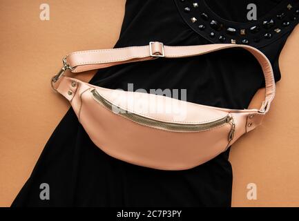 Fashionable stylish belt leather bag in pink color Stock Photo