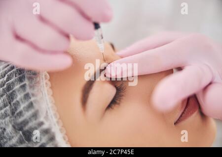Performance of high quality anti aging therapy Stock Photo