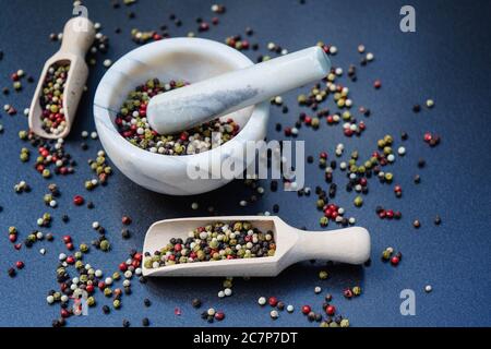 peppercorns of piper cubeba with a wooden spoon Stock Photo