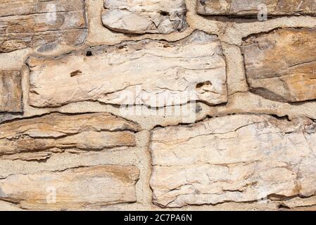 Wall made of natural stones Stock Photo