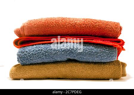Closeup shot of colorful bathing towels isolated on a white background Stock Photo