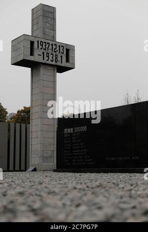 Giant grey cross in The Memorial Hall of the Victims in Nanjing Massacre by Japanese Invaders. Stock Photo