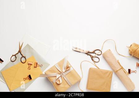 Gift boxes with supplies on white background Stock Photo