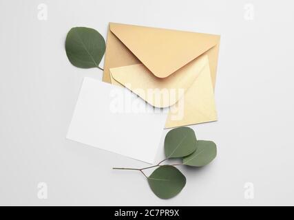 Blank card with envelopes on white background Stock Photo