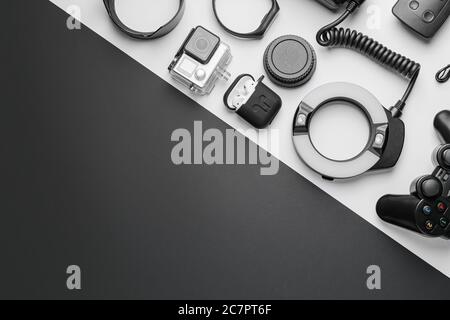 Different modern devices on black and white background Stock Photo