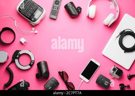 Frame made of different modern devices on color background Stock Photo