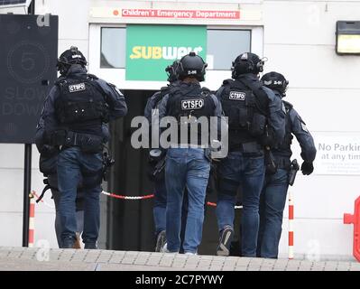 Counter Terrorist Specialist Firearms Officers at the Royal Sussex County Hospital in Brighton, a man has been arrested on suspicion of attempted murder after a member of hospital staff was stabbed, according to police. Stock Photo