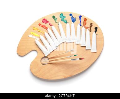 Paints and artist's palette on white background Stock Photo