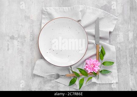 Beautiful table setting on grey background Stock Photo