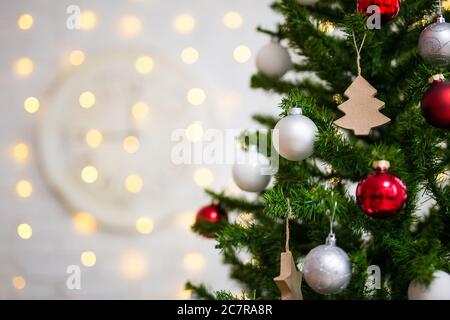 christmas background - close up of decorated christmas tree with colorful balls and lights Stock Photo