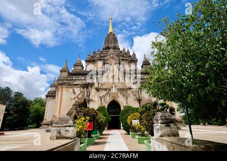 facade entrance of magnificent Gawdawpalin Temple under blue sky white clouds. In Bagan Myanmar. Perspective and wide angle Stock Photo