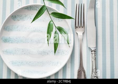 Simple table setting in restaurant Stock Photo