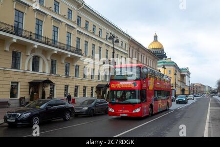 March 30, 2019 Saint Petersburg, Russia Red tour bus on a street in  Saint Petersburg. Stock Photo