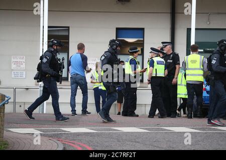 Counter Terrorist Specialist Firearms Officers at the Royal Sussex County Hospital in Brighton, a man has been arrested on suspicion of attempted murder after a member of hospital staff was stabbed, according to police. Stock Photo