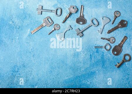 Many keys on color background Stock Photo