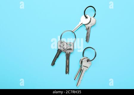 Many keys on color background Stock Photo