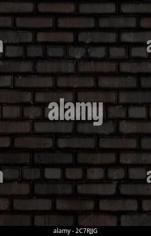 Plain black brick wall background Stock Photo