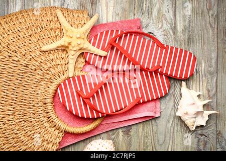 Set of beach accessories on wooden background Stock Photo