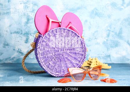 Set of beach accessories on color background Stock Photo
