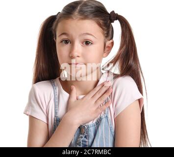 Apologizing little girl on white background Stock Photo - Alamy