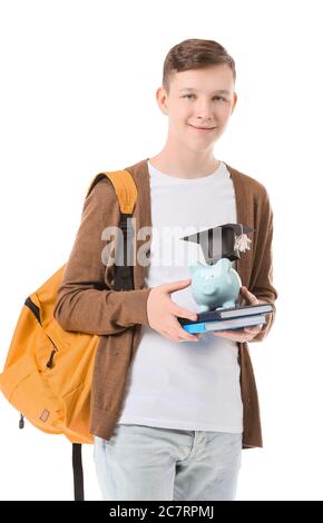 Teenage boy with savings for education on white background Stock Photo