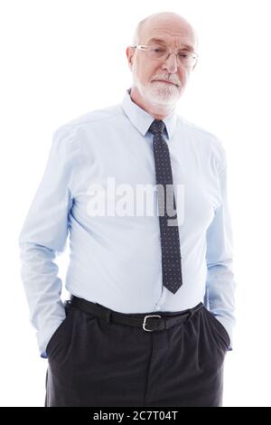 Senior Businessman stands with hands in pockets studio isolated on white background Stock Photo