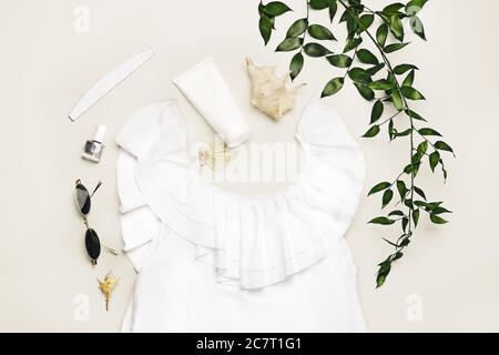 Summer composition with female clothes on white background Stock Photo