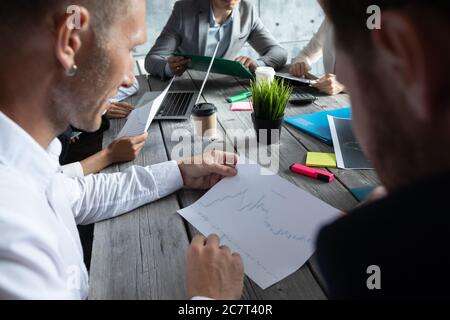 Business people analyzing data diagrams financial reports development strategy Stock Photo