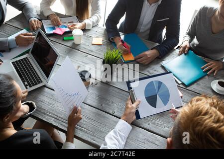 Business people analyzing data diagrams financial reports development strategy Stock Photo