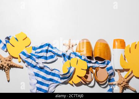 Composition with beach accessories on white background Stock Photo