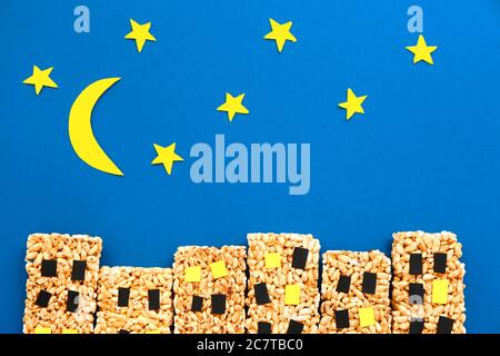 Composition with crispy rice bars on color background Stock Photo