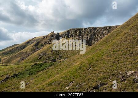 Alport Dale is a remove valley in the Peak District National Park with mant waterfalls and the famous Alport Castles, a major landslip Stock Photo