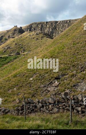 Alport Dale is a remove valley in the Peak District National Park with mant waterfalls and the famous Alport Castles, a major landslip Stock Photo