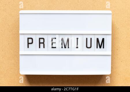 Lightbox with word premium on wood background Stock Photo