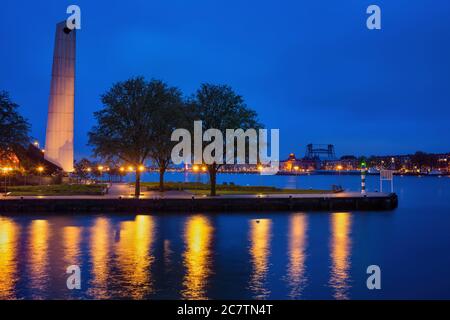 Rotterdam city river waterfront at night with De Boeg (The Bow) WWII war memorial monument, Holland, the Netherlands Stock Photo