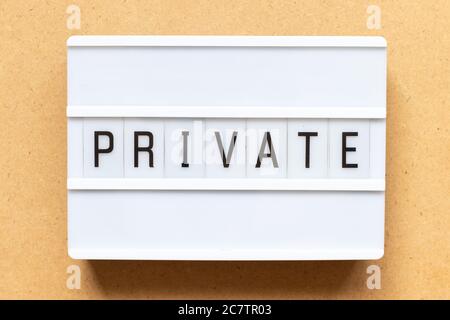 Lightbox with word private on wood background Stock Photo