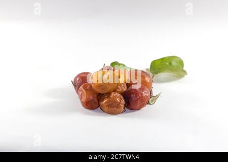 Ziziphus mauritiana sweet fruits, also known as Chinese date, Chinese apple, Indian jujube or plum, Musawu or Maçanica.  It is quite rich in Vitamin C Stock Photo