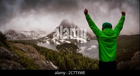 Adventure Man Composite with Beautiful panoramic View of the Iconic Canadian Rocky Mountain
