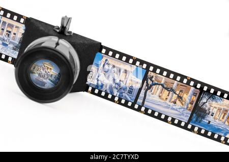 Device for viewing and tagging on film, isolated on white background. Classic photography. Stock Photo