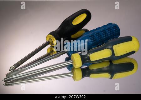 Screwdriver Set isolated on gray background. mirror reflection Stock Photo