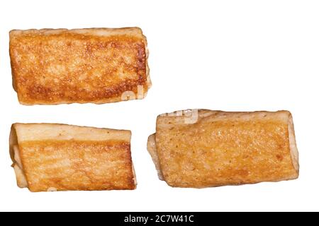 Stuffed fried pancakes, fried crepes with filling, isolated on white Stock Photo