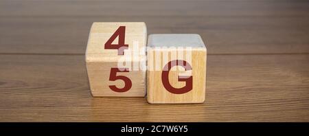 Change wooden block from 4G to 5G. Technology, network, communication concept. Stock Photo