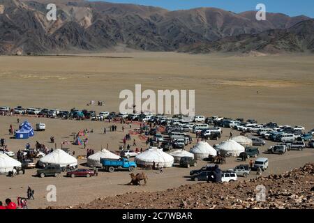 Tourists and locals attend the 2017 Sagsai Golden Eagle Festival in western Mongolia. Stock Photo