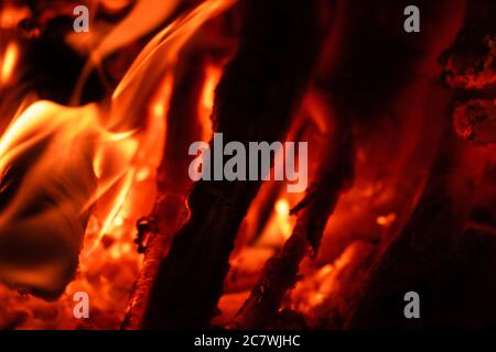Dancing flame charcoal burning in the camp fire at night Stock Photo ...