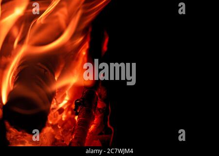 Dancing flame charcoal burning in the camp fire at night.e Stock Photo ...