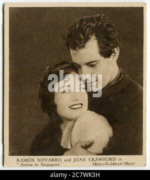 'Love Scenes from Famous Films' Kensitas cigarette card - Ramon Novarro and Joan Crawford in 'Across to Singapore'. Second series published in 1932 by J. Wix & Sons Ltd. Stock Photo