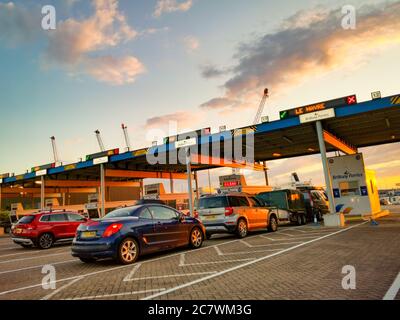 Portsmouth, UK. Sunday 19 July 2020. Passengers queue for ferries to Bilbao, La Havre and Caen at the Docks in Portsmouth as travel restrictions to Europe are eased after the Covid-19 lockdown. Credit: Thomas Faull/Alamy Live News Stock Photo
