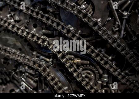 Close up of metal chains bonded together with different small metal parts Stock Photo